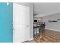Inviting entryway flows into a dining area, with appealing hardwood flooring at 1455 E Katie Ave # D17, Las Vegas, NV 89119