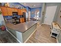 Spacious kitchen with a breakfast nook, stainless steel appliances, and ample counter space at 2598 Fountain Ave, Pahrump, NV 89048