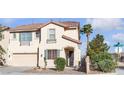 Lovely home with a tile roof, two-car garage, and tidy landscaping, showcasing curb appeal at 3194 Lapis Beach Dr, Las Vegas, NV 89117