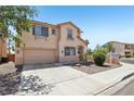 Lovely two-story home boasting a two-car garage, desert landscaping, and a clean, well-maintained yard at 3194 Lapis Beach Dr, Las Vegas, NV 89117
