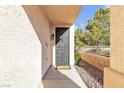 Inviting front porch with a decorative security door and a well-maintained walkway leading to the entrance at 3194 Lapis Beach Dr, Las Vegas, NV 89117