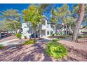 Inviting condo community with lush landscaping and plenty of parking at 5217 Caspian Springs Dr # 101, Las Vegas, NV 89120