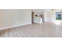 A spacious living area featuring light wood floors at 5217 Caspian Springs Dr # 101, Las Vegas, NV 89120