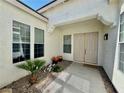 Welcoming front entrance with double doors and manicured landscaping at 5422 Nestled Moon Ct, Las Vegas, NV 89131