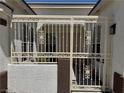 Inviting gated front entrance showcasing security and charm at 5422 Nestled Moon Ct, Las Vegas, NV 89131