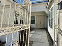 Inviting gated front entrance showcasing security and charm at 5422 Nestled Moon Ct, Las Vegas, NV 89131