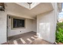 Cozy outdoor patio space with window, perfect for relaxing or entertaining at 6711 W Charleston Blvd # 2, Las Vegas, NV 89146