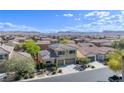 Beautiful two-story home with solar panels in a vibrant community with mountain views at 7417 Horizon Rock Ave, Las Vegas, NV 89179