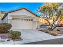 Charming single-story home featuring a two-car garage and well-maintained landscaping at 7849 Montour Falls St, Las Vegas, NV 89149