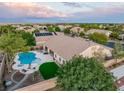 Expansive backyard with pool, spa, patio, and lush landscaping at 8356 Shady Lady Ct, Las Vegas, NV 89131