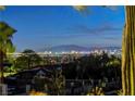 Expansive city views from the property, showcasing the vibrant Las Vegas skyline and surrounding mountains at 853 Morning Sun Ct, Las Vegas, NV 89110