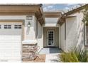 Close-up of the front door, showcasing the stylish entry and decorative accents at 3312 Lapwing Dr, North Las Vegas, NV 89084