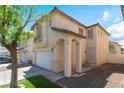 Attractive home featuring a front yard with a lawn and easy street access, plus a two-car garage at 4321 Stockbridge St, Las Vegas, NV 89115