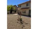 Backyard view with desert landscaping at 5024 Saint Annes Dr, Las Vegas, NV 89149