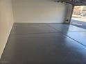 A spacious gray epoxy-coated garage at 5250 S Rainbow Blvd # 1140, Las Vegas, NV 89118