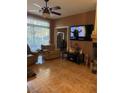 Comfortable living room with tile flooring, ceiling fan, and a cozy place to relax and unwind at 7400 W Flamingo Rd # 1090, Las Vegas, NV 89147