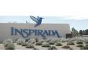 Inspiraada community sign with a blue hummingbird logo at 3210 Centano Ave, Henderson, NV 89044