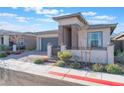 Charming single-story home featuring a welcoming courtyard and desert-friendly landscaping at 421 Point Sur Ave, Las Vegas, NV 89138
