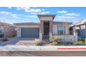 Beautiful single-story home with a charming courtyard and well-maintained landscaping at 421 Point Sur Ave, Las Vegas, NV 89138