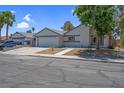 Lovely single-story home with an attached garage, tidy landscaping, and appealing curb presence at 6181 Cedarwood Ave, Las Vegas, NV 89103