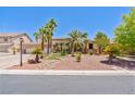 Beautiful single story home featuring desert landscaping and stone accents at 6224 Red Pine Ct, Las Vegas, NV 89130