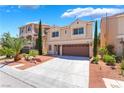 Charming two-story home with a well-maintained lawn and a two-car garage at 6821 Treble Clef Ave, Las Vegas, NV 89139