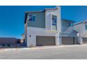 Two-story modern homes with attached garages and sleek exteriors at 9756 Rock Cliff St, Las Vegas, NV 89141