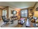 Open living room featuring neutral walls, plush carpet, and contemporary furniture at 1150 N Buffalo Dr # 1022, Las Vegas, NV 89128