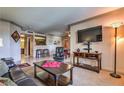 Spacious living room boasting neutral walls, plush carpet, and contemporary furniture at 1150 N Buffalo Dr # 1022, Las Vegas, NV 89128