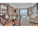 Inviting living room featuring stylish furnishings, large windows, and city views at 135 E Harmon Ave # 1102, Las Vegas, NV 89109