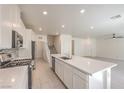 Spacious kitchen featuring an island, modern appliances, and open access to other rooms at 219 Cordelia Cove Ave # 513, Henderson, NV 89011