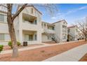 Charming condo complex with stairs and balconies, offering comfortable outdoor spaces at 3318 N Decatur Blvd # 1061, Las Vegas, NV 89130