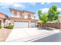 Charming two-story home with a three-car garage and desert landscaping at 3786 Port Ritchey St, Las Vegas, NV 89147