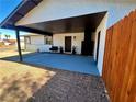 Charming covered front patio with ample space for seating and decor at 407 Tiger Lily Way, Henderson, NV 89015