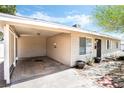 Home featuring covered parking and neat landscaping at 429 Scenic Dr, Henderson, NV 89002