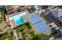Bird's eye view of the community pool and tennis court; ideal for recreation at 1309 Dorothy Ave # 4, Las Vegas, NV 89119