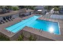 Large, rectangular community pool with sun deck; the perfect place to relax at 1309 Dorothy Ave # 4, Las Vegas, NV 89119