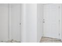 Bright foyer featuring marble floors, with a white front door and a closet at 7331 Carrot Ridge St, Las Vegas, NV 89139
