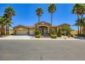 Charming stone home with manicured landscaping and a spacious three-car garage at 8078 Leather Harness St, Las Vegas, NV 89131