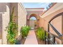 Inviting home exterior featuring a walkway leading to the front door at 9445 January Dr, Las Vegas, NV 89134