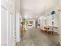 Bright, open-concept living space with hardwood flooring and modern decor at 9445 January Dr, Las Vegas, NV 89134