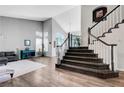 Inviting foyer featuring soaring ceilings, staircase, and natural light at 2016 Catalina Marie Ave, Henderson, NV 89074
