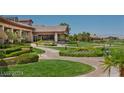 Lush landscaping surrounds the building with walkways for easy access and enjoyment at 2158 Alyssa Jade Dr, Henderson, NV 89052