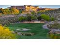 Beautiful golf course view with lush green grass, trees, and sand traps at Sun City Anthem at 2158 Alyssa Jade Dr, Henderson, NV 89052