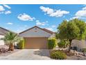 Charming single-story home with a well-maintained front yard and an inviting garage at 2158 Indigo Creek Ave, Henderson, NV 89012