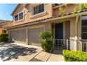 Inviting two-story home featuring a two-car garage and neatly trimmed landscaping at 2232 Le Conte Ave, Henderson, NV 89074