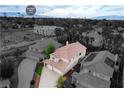 Aerial shot of a home with red roof tiles near the Las Vegas Strip, offering a unique and convenient location at 2679 Regency Cove Ct, Las Vegas, NV 89121