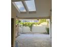 Private courtyard featuring a wall with climbing vines, providing a serene outdoor space at 2989 Bel Air Dr, Las Vegas, NV 89109