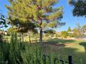 Picturesque view of the green golf course featuring mature trees and well-maintained landscaping at 2989 Bel Air Dr, Las Vegas, NV 89109