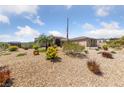Well-maintained front yard with desert landscaping and a charming home at 3955 W Jo Rae Ave, Las Vegas, NV 89141